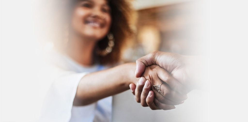 Two people shaking hands